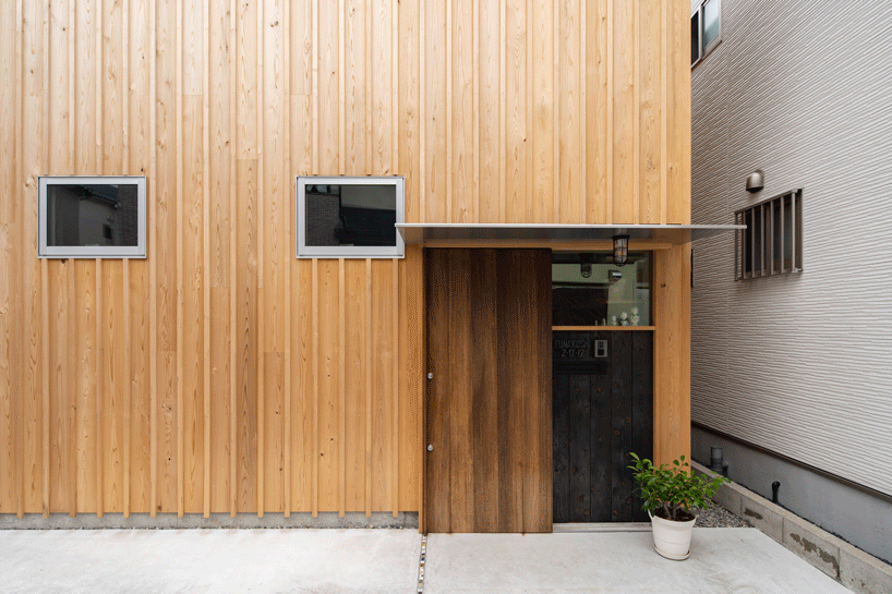 coil kazuteru matumura architects builds a climbing wall into 'F-house' in japan