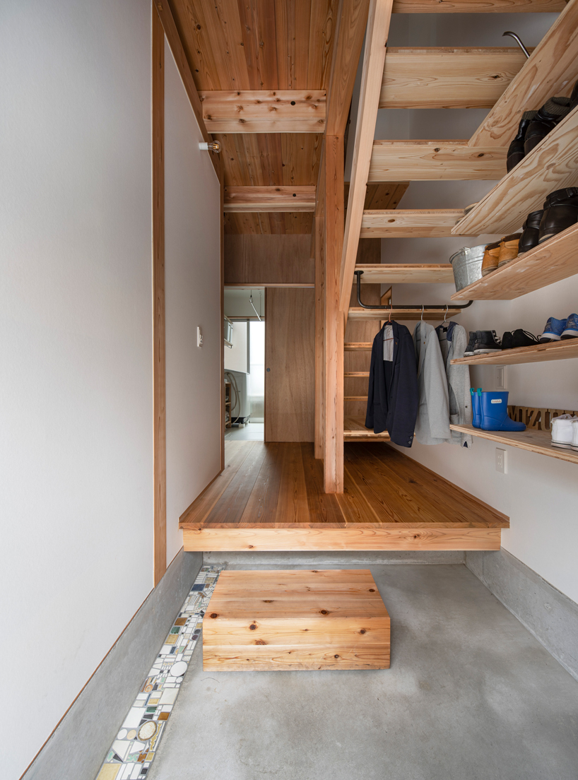 coil kazuteru matumura architects builds a climbing wall into 'F-house' in japan