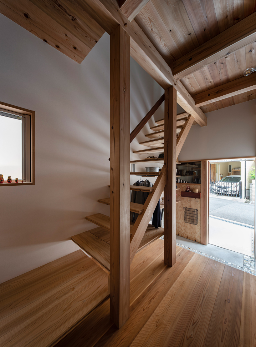 coil kazuteru matumura architects builds a climbing wall into 'F-house' in japan