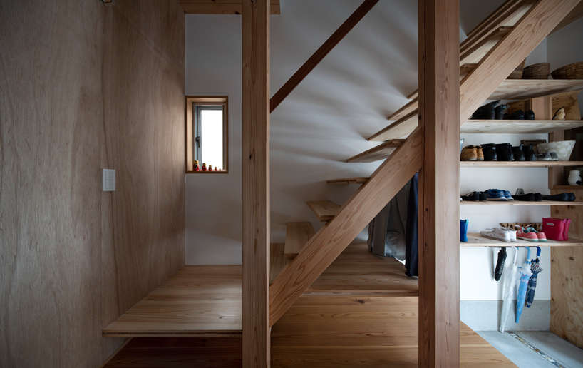 coil kazuteru matumura architects builds a climbing wall into 'F-house' in japan