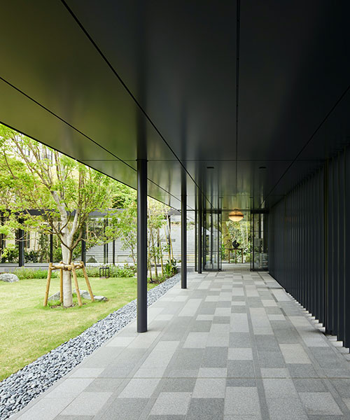 FHAMS & kosaka transform old school in kyoto into spacious hotel with zen gardens