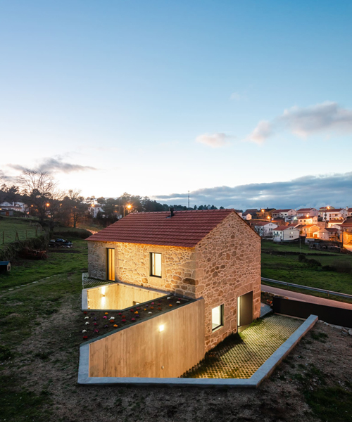 filipe pina adds an underground concrete patio to house restoration in portugal