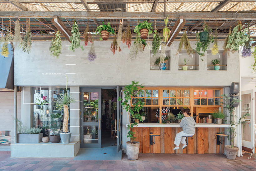 fathom completes the concrete façade of this japanese flower shop with an open counter