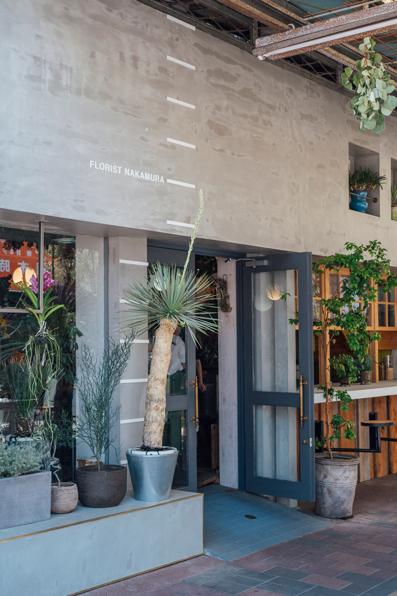fathom completes the concrete façade of this japanese flower shop with an open counter