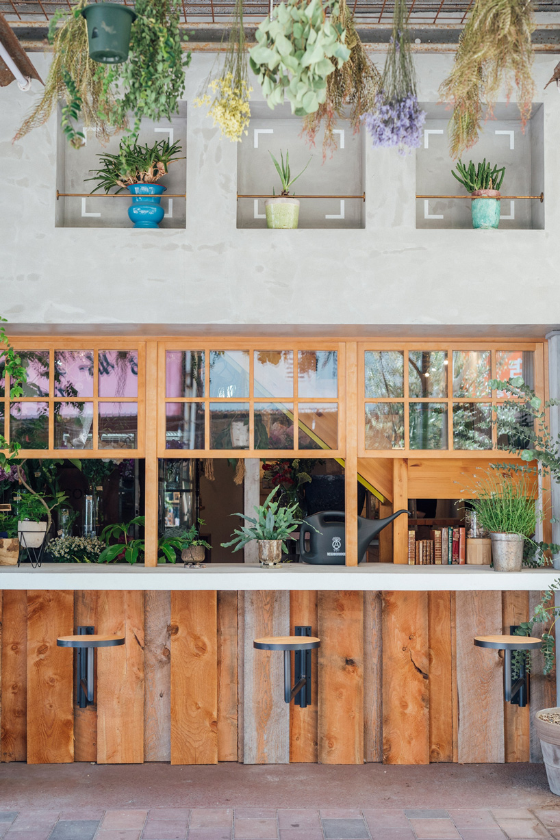 fathom completes the concrete façade of this japanese flower shop with ...