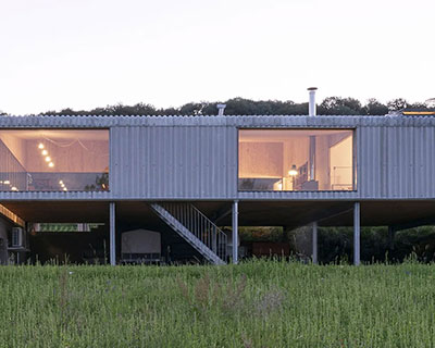 gens combines residence & wine cellar within agricultural shed in rural france