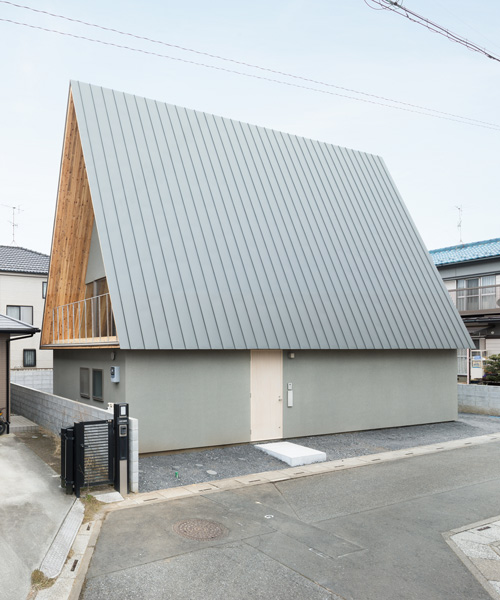 aoyagi design tops 'house in iruma' with seven-meter-tall triangular attic space in japan