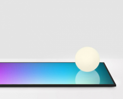 a moon-shaped lamp sits atop a color-changing display created by imagebook