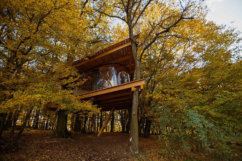this treehouse by jan tyrpekl features a 360-degree view of nature
