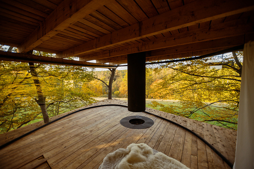this treehouse by jan tyrpekl features a 360-degree view of nature