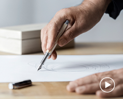 kengo kuma collaborates with caran d'ache to create stylish wood and steel pen