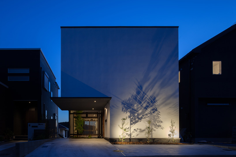 LEVEL architects conceals bright inner courtyard behind this house's blank façade in japan