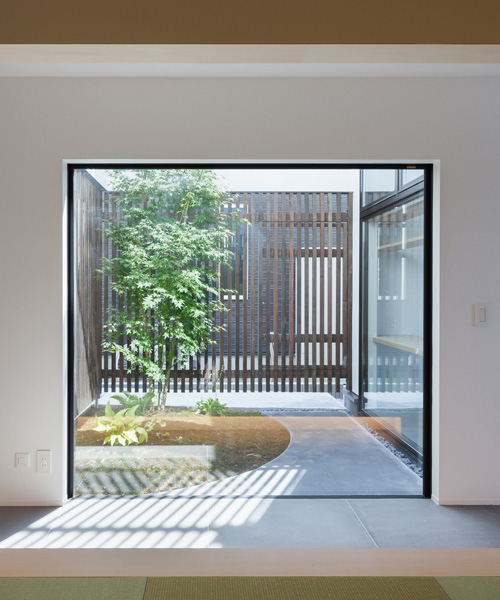 LEVEL architects conceals bright inner courtyard behind this house's blank façade in japan