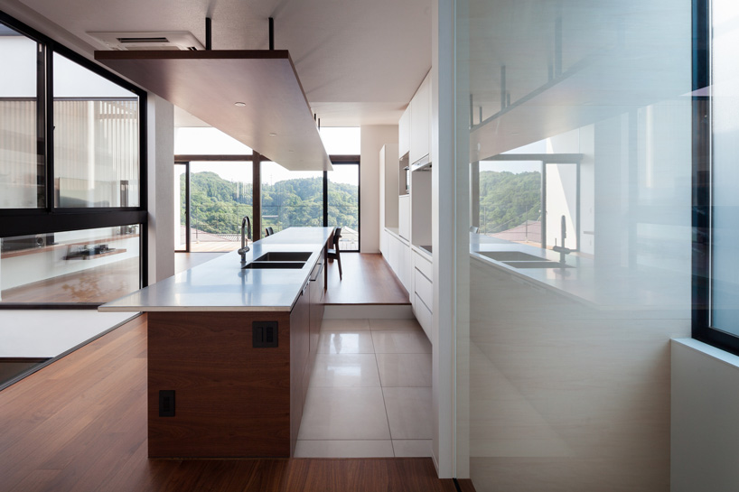 LEVEL architects conceals bright inner courtyard behind this house's blank façade in japan