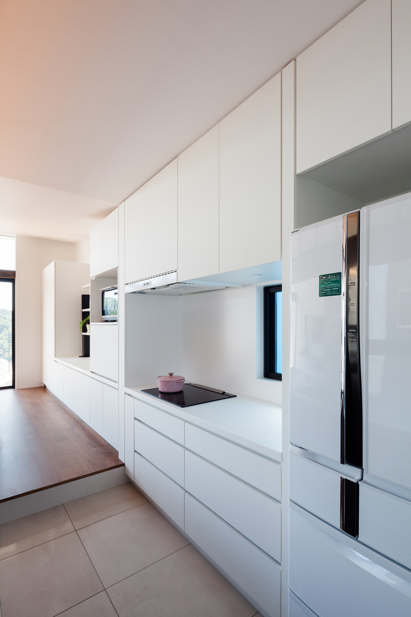 LEVEL architects conceals bright inner courtyard behind this house's blank façade in japan