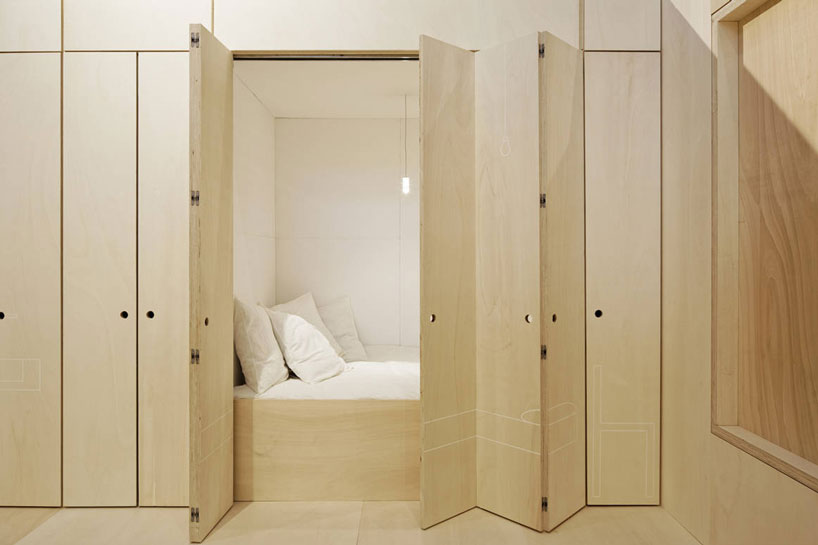 bedroom behind wooden doors