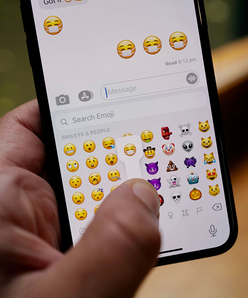 apple hides a smile behind mask emoji because wearing one doesn't have to mean you're sick