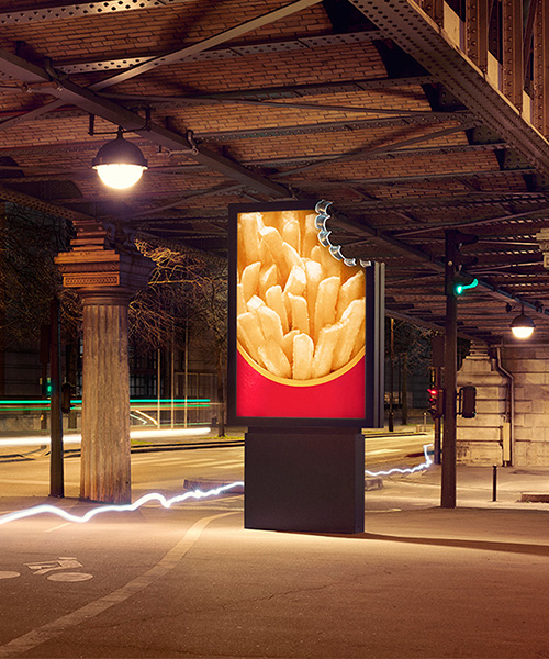 mcdonald's paris billboards are so provocative they have been literally bitten