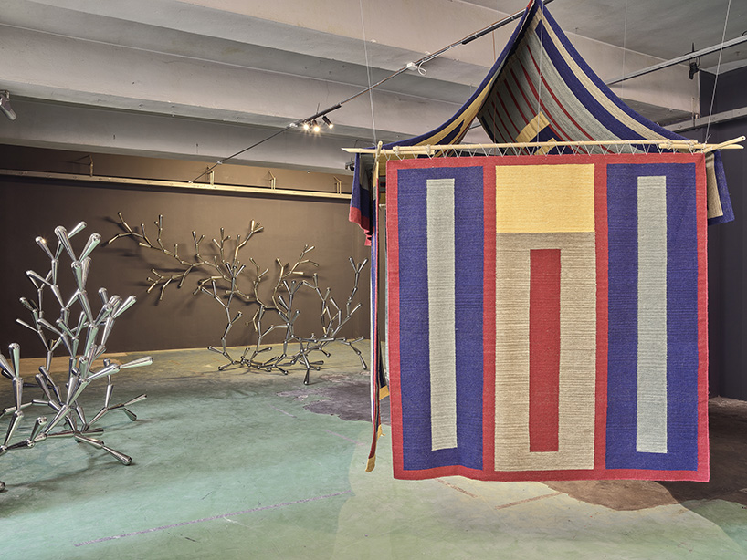 michele de lucchi presents 'many hands make one' carpet houses