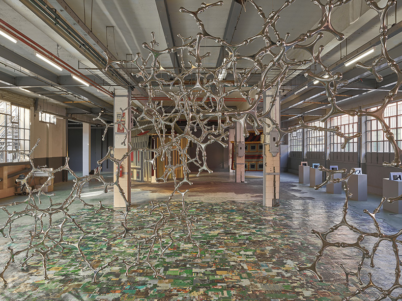 michele de lucchi presents 'many hands make one' carpet houses