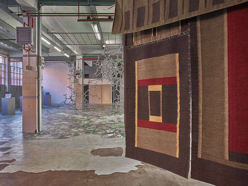 michele de lucchi presents 'many hands make one' carpet houses