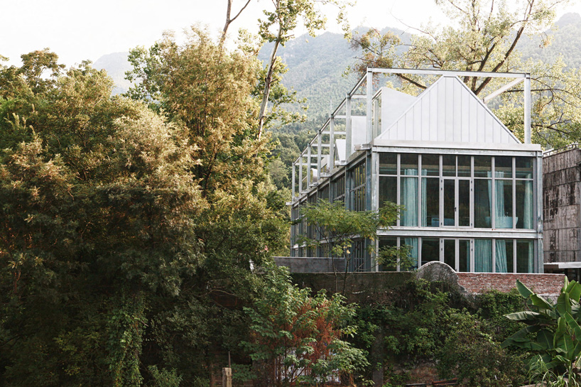 monolith architects transforms abandoned factory into 'ten times hotel' in rural china
