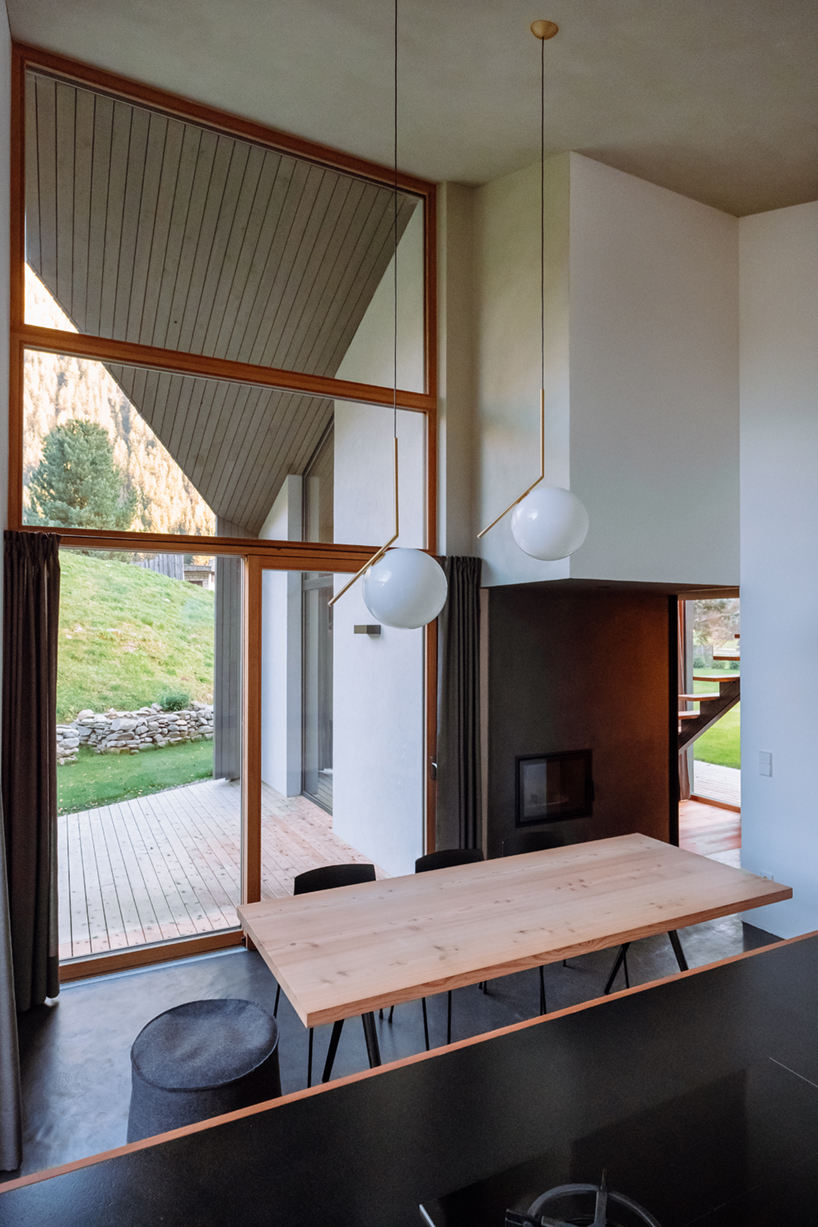 plasma studio's contemporary 'house L' integrates with its traditional tyrolean context