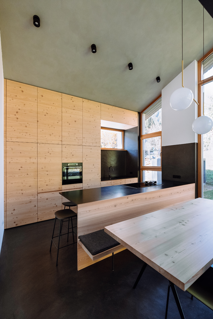 plasma studio's contemporary 'house L' integrates with its traditional tyrolean context