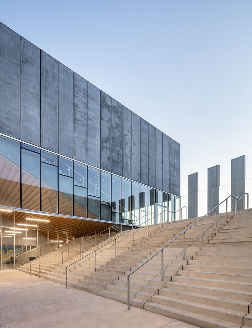 randja architects completes robust stone & concrete technology park in france