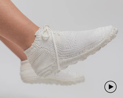 shahar asor knits children's shoes with an expiration date using biodegradable thread