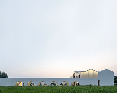 studio 10 transforms community center in china with cloister courtyard & arched verandas