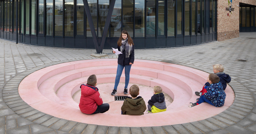 studio ossidiana creates colorful concrete landscape for school playground in the netherlands