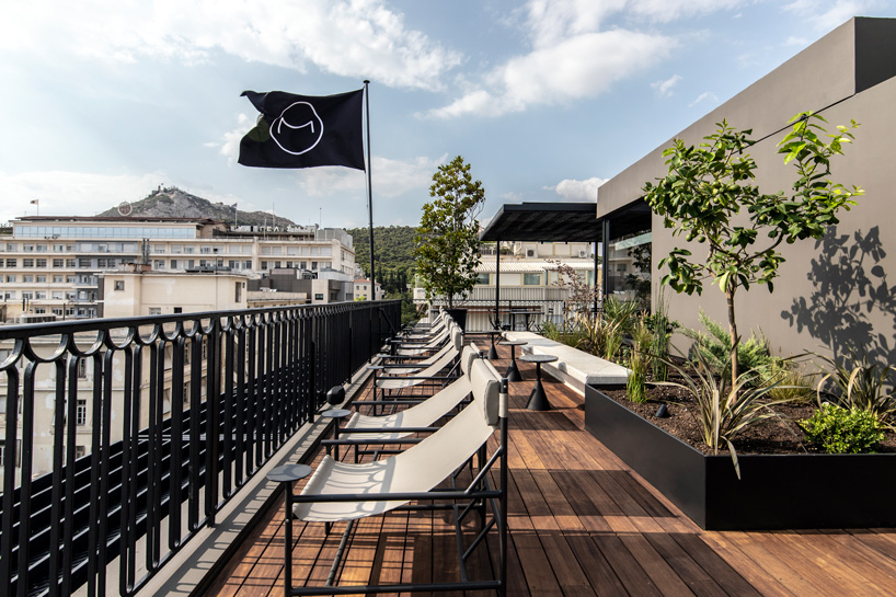 rooftop garden with sun beds in 'the modernist' boutique hotel in athens
