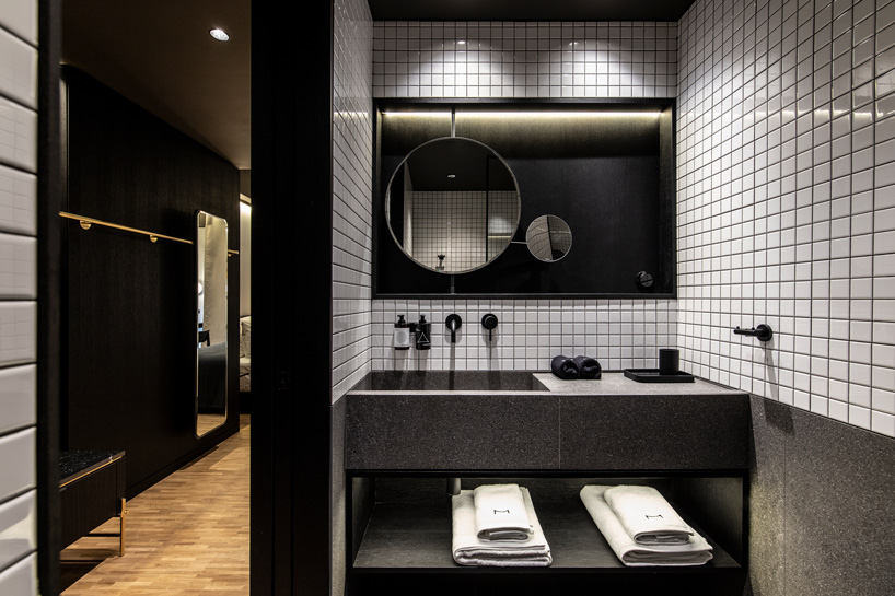 bathroom with white tiles in 'the modernist' boutique hotel in athens