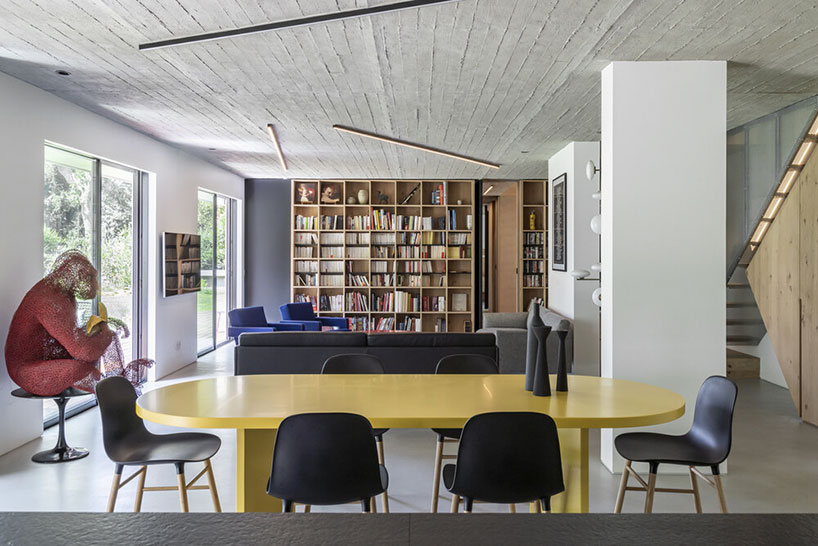 toledano + architects adds geometric wood + metal staircase to apartment in paris