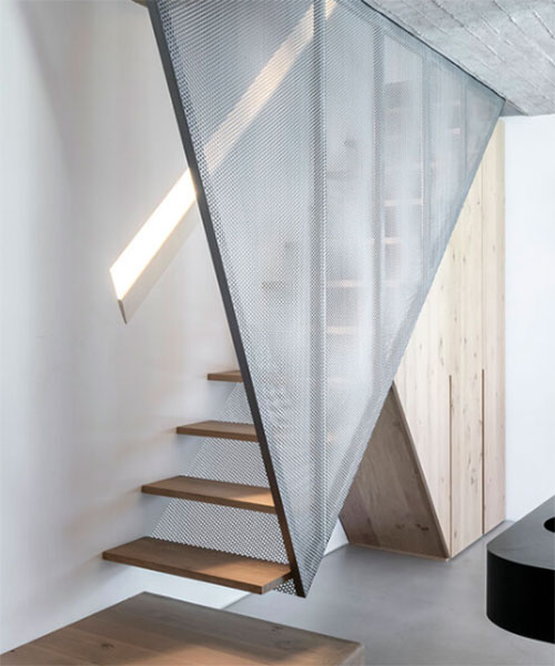 toledano + architects adds geometric wood and metal staircase to apartment in paris
