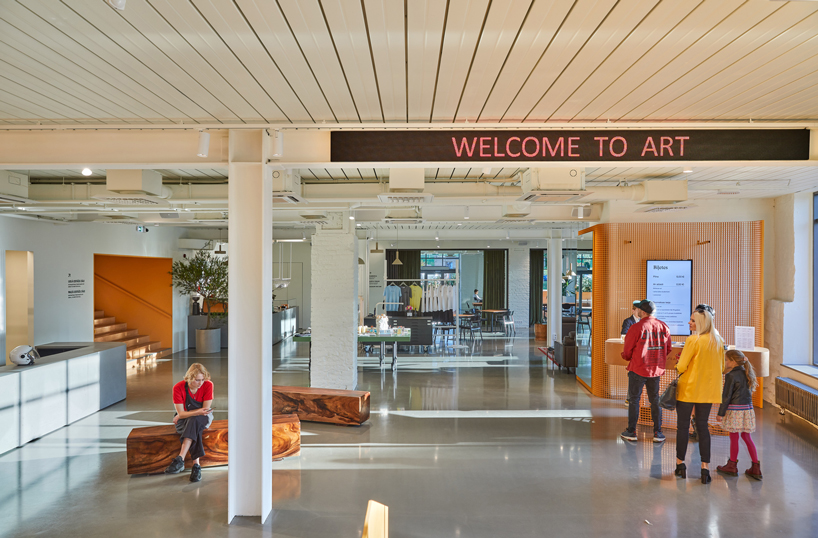 energetic orange adorns the zuzeum art center in riga, designed by annvil designboom