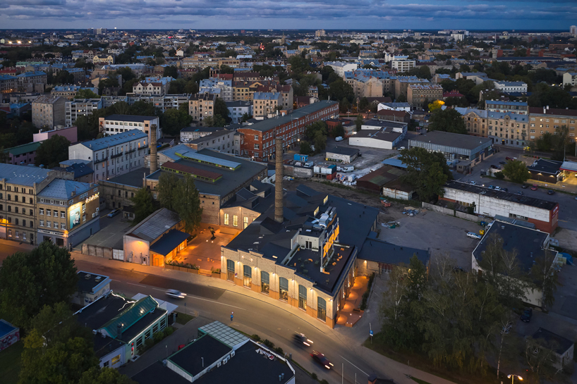 energetic orange adorns the zuzeum art center in riga, designed by annvil designboom
