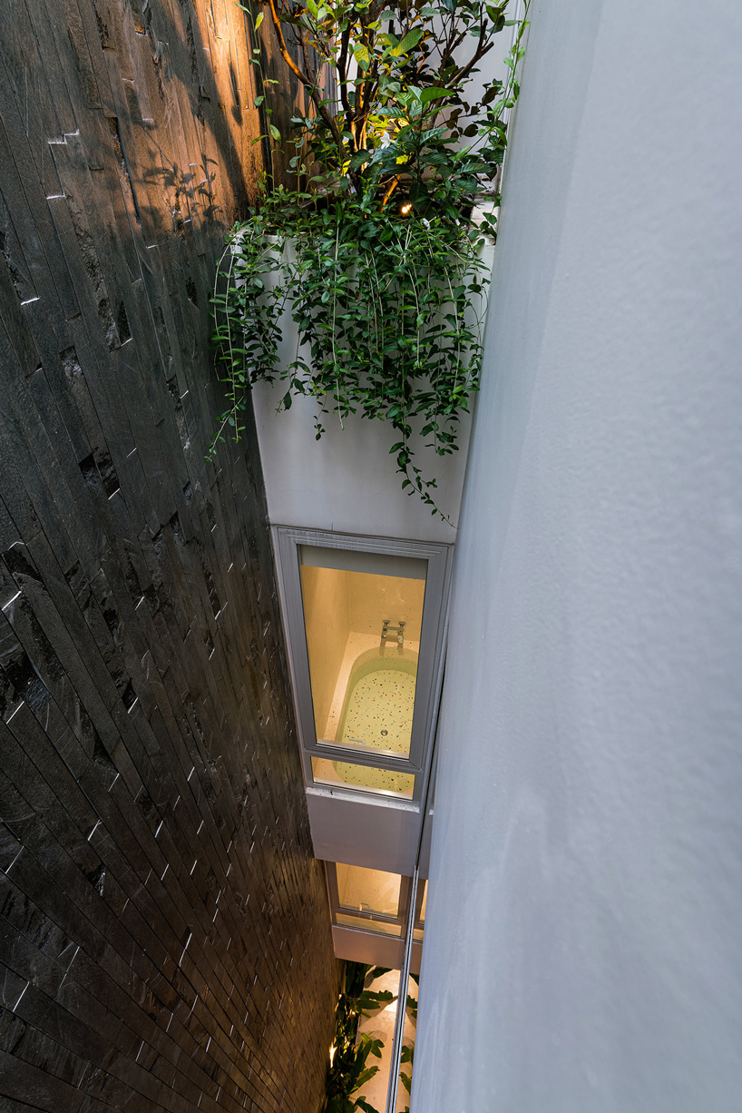 tube-shaped, perforated steel façade clads AD9 architects' lvs.house in vietnam
