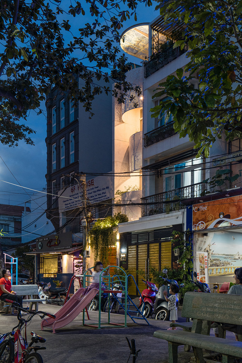 tube-shaped, perforated steel façade clads AD9 architects' lvs.house in vietnam