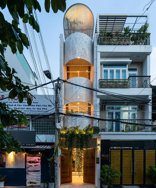 tube-shaped, perforated steel façade clads AD9 architects' lvs.house in vietnam