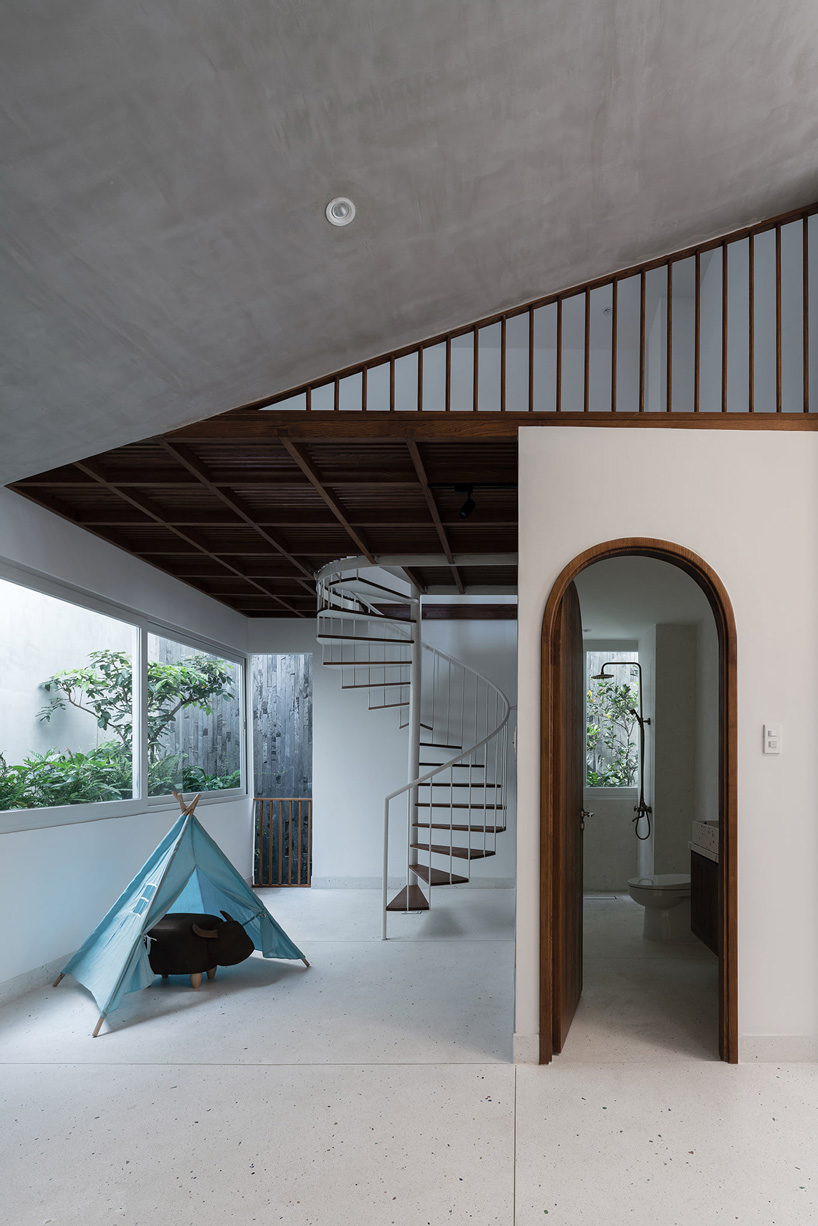 tube-shaped, perforated steel façade clads AD9 architects' lvs.house in vietnam