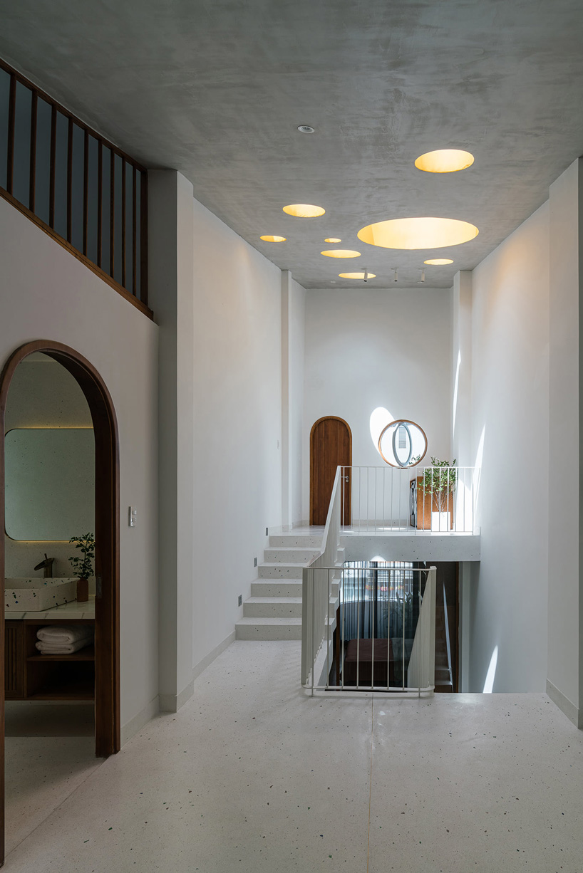 tube-shaped, perforated steel façade clads AD9 architects' lvs.house in vietnam