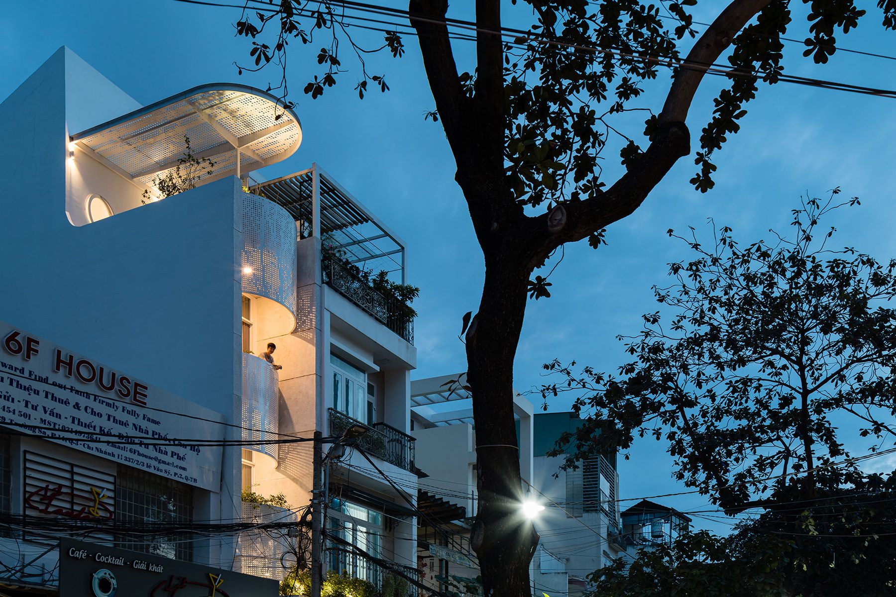 tube-shaped, perforated steel façade clads AD9 architects' lvs.house in vietnam