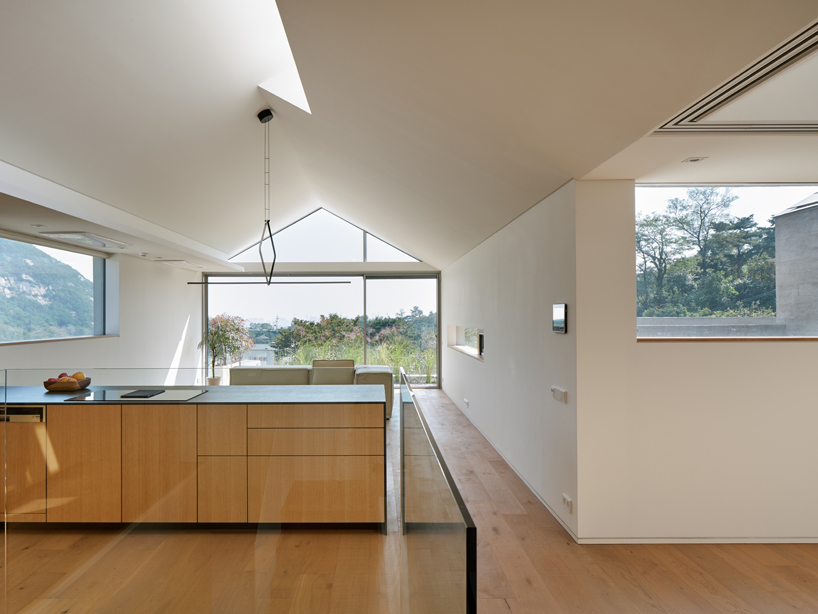 archihood WxY brings 2 families under one roof for 'doo jip' house in seoul designboom