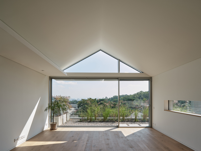 archihood WxY brings 2 families under one roof for 'doo jip' house in seoul designboom