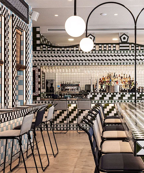 artisan ceramic tile patterns clad restaurant interior by masquespacio in valencia, spain