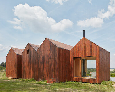 atelier 111 architekti completes 'cottage near a pond' in the czech republic