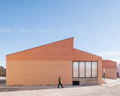 BIZNA estudio designs a brick-faced meeting place for a village community in spain