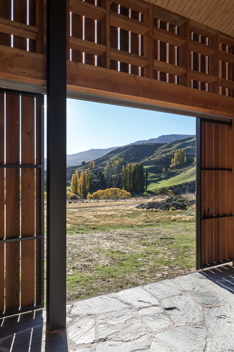 RTA studio nestles a timber-clad holiday home into new zealand's southern alps